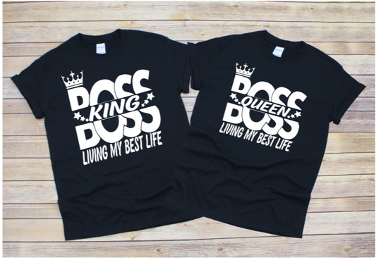 Black and white t-shirts. One says Boss King, living my best life. The other says Boss queen, living my best life. Designed for couples.